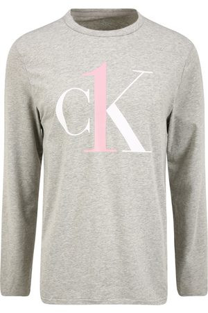 Pánské tričko NM2017E PGK šedá - Calvin Klein šedá