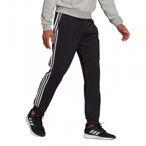Kalhoty adidas Essentials Tapered Cuff 3 Stripes M GK8980 s